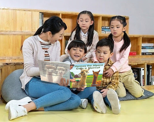 children reading farm animal books with alpaca cow and pig characters
