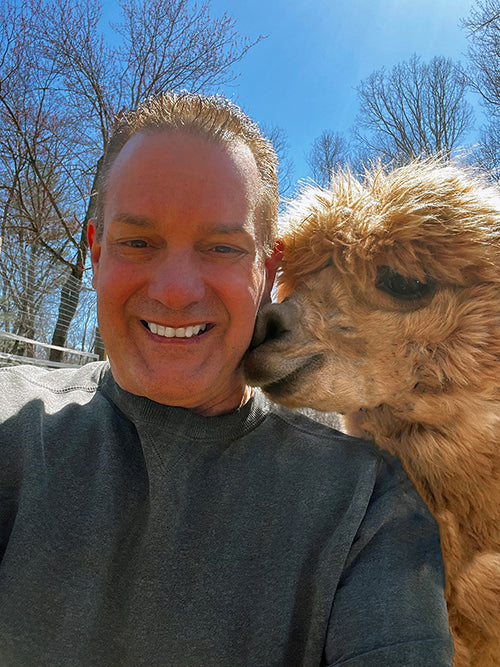 Author Kevin M. Cordeiro with Hermey the Alpaca